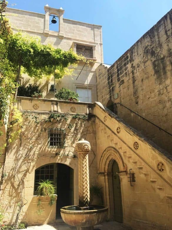 the courtyard of palazzo palson with the external staircase