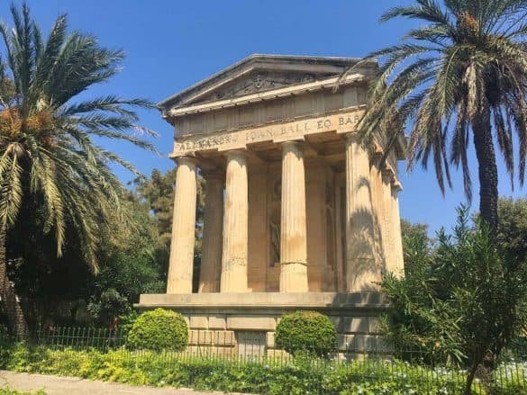 neoclassical monument in gardens