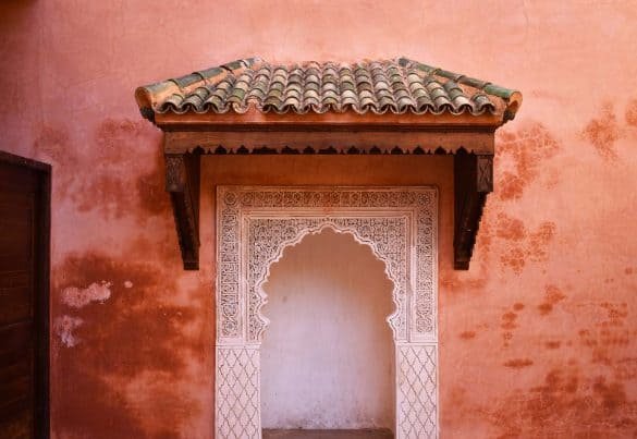 Saadien’s Tombs – Royal Necropolis, Marrakesh white window on a sunbaked wall at saadien's tomb