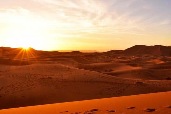 Sand Dunes – Merzouga Desert, Morocco Sunset at Sand Dunes - Merzouga Desert, Morocco
