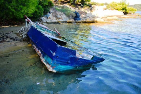abandoned blue boat at galini agiou nikolaou