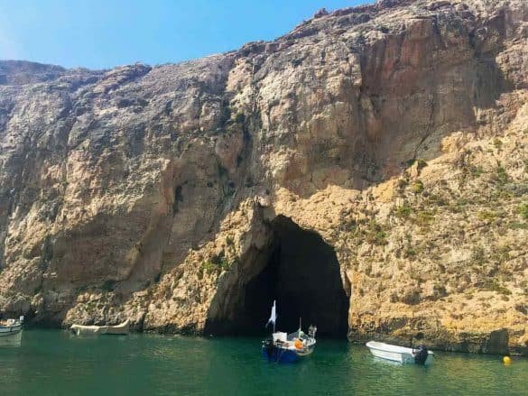 caves and an interior lake with ships at malta