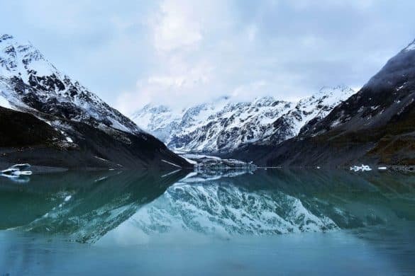 Hooker Lake – Aoraki/ Mount Cook National Park, New Zealand the glacier hooker lake with mt cook' reflection over it