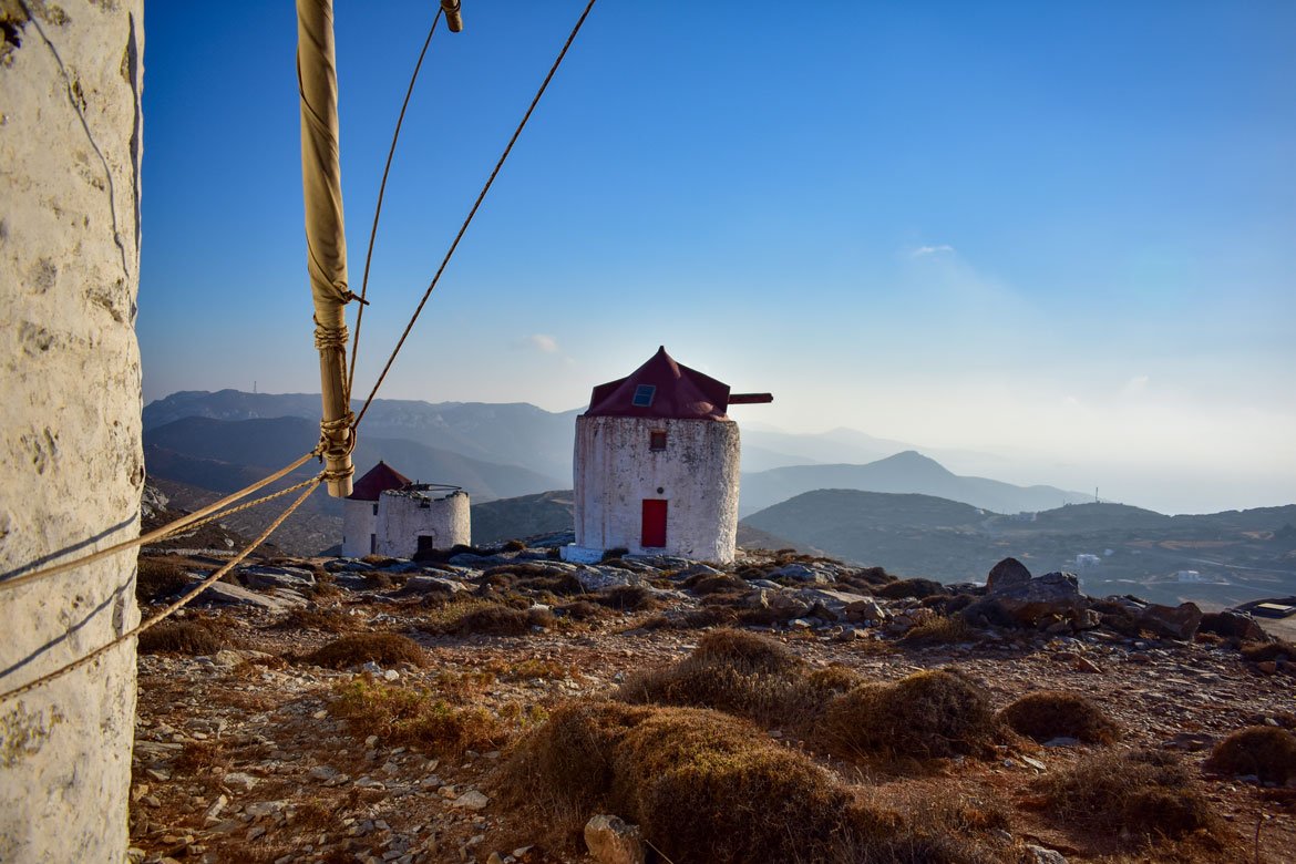 traditional greek windmills on a hill